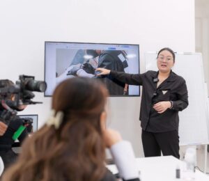 Artist Master Nguyen Ngan acting as a PMU Master Trainer, providing hands-on instruction to students at Rio Beauty Clinic