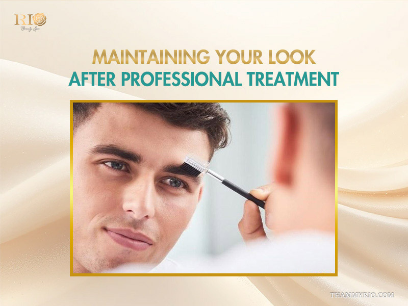 A man using a brush to maintain his groomed eye brows for men after a professional treatment.
