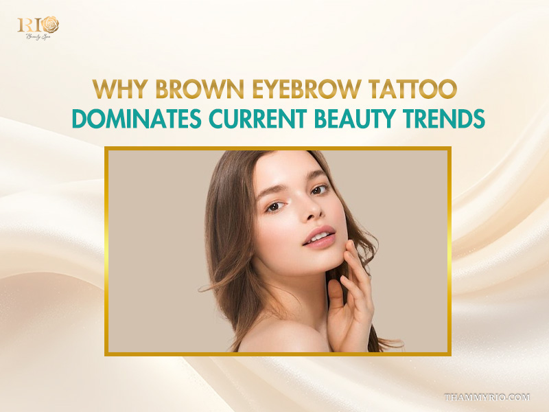 A beautiful young woman showcasing the popular brown eyebrow tattoo trend.