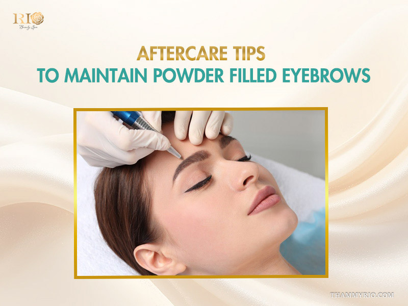 Professional aesthetician applying a protective layer during a permanent brow powder session to ensure proper healing.