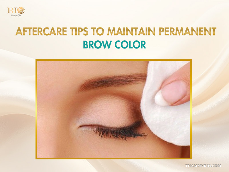 A woman gently cleaning her brow area as part of the aftercare for permanent eyebrow tinting.