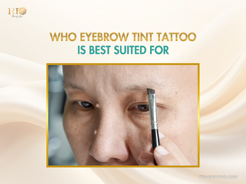 A person with thin eyebrows applying makeup, illustrating who eyebrow tint tattoo is best suited for.