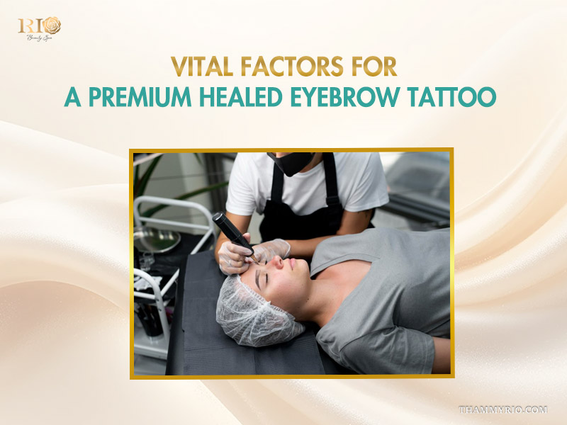 Professional permanent makeup artist performing a procedure to ensure premium healed tattoo eyebrows for a female client.