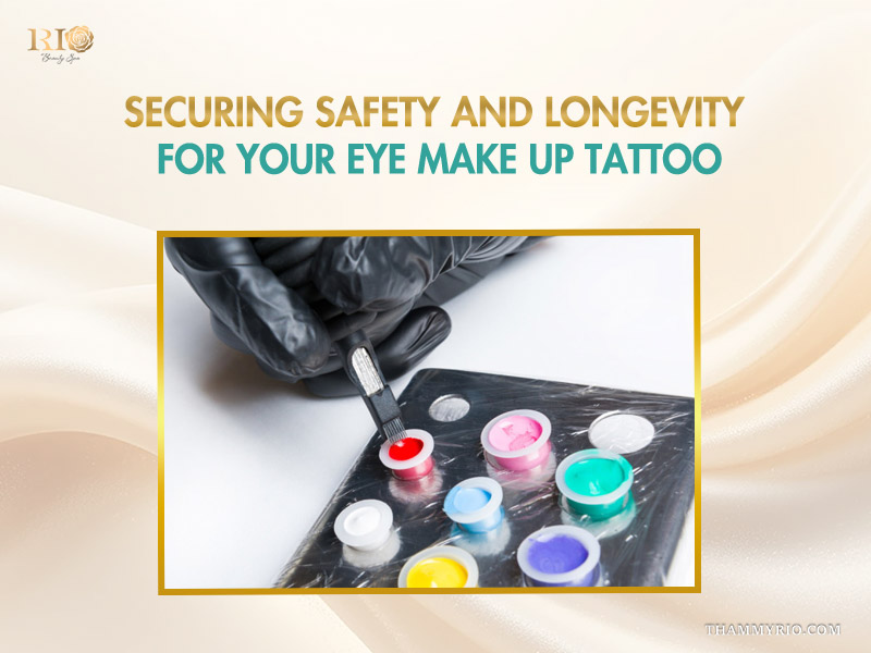 A professional technician preparing colorful pigments for a safe eye makeup tattoo procedure