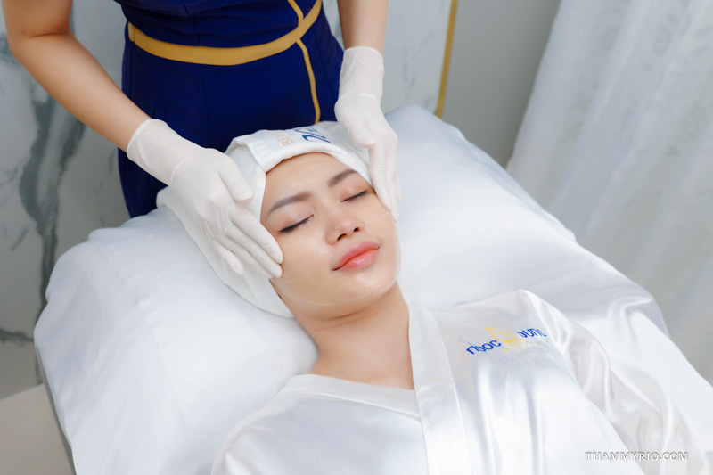 A customer experiencing premium facial care and preparation for microblading near me at Ngọc Dung Beauty Center.