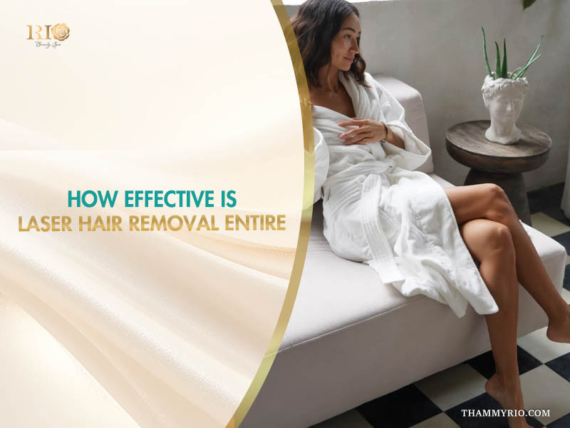 A relaxed person in a silk bathrobe smiling on a sofa after a laser hair removal entire body treatment.