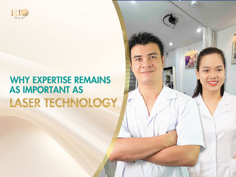 Two professional experts in medical uniforms posing together during an nd yag laser hair removal consultation.