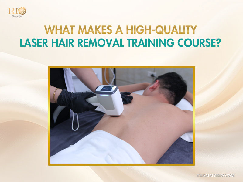 Practitioner operating a laser hair removal handpiece on a client's back on a course banner
