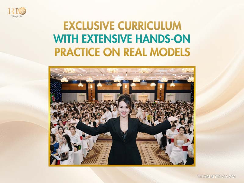 Female instructor presenting on stage in front of a large conference hall filled with trainees. Laser hair removal training course